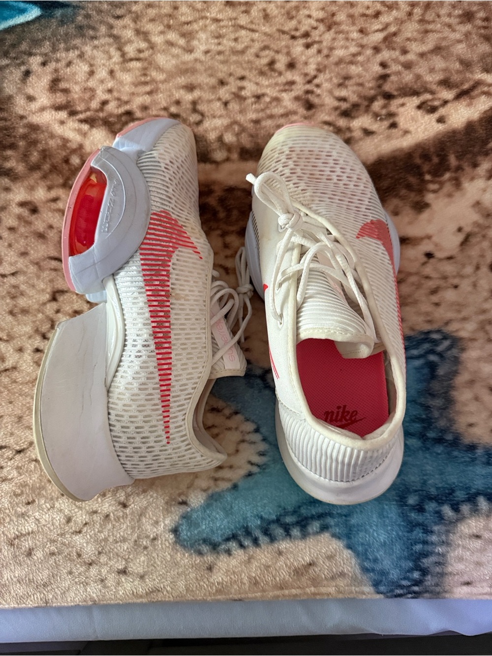 Nike Women's White Running Sneakers with Coral Swoosh